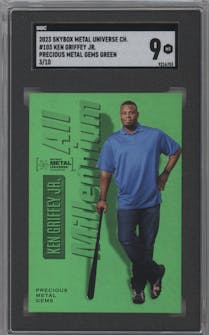 Ken Griffey Jr. from the 2023 Skybox Metal Universe Champions set featuring a Green Precious Metal Gems parallel graded by SGC and given an overall grade of 9.