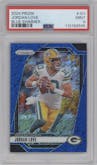 Jordan Love from the 2024 Panini Prizm set featuring a Blue Shimmer parallel graded by PSA and given an overall grade of 9.
