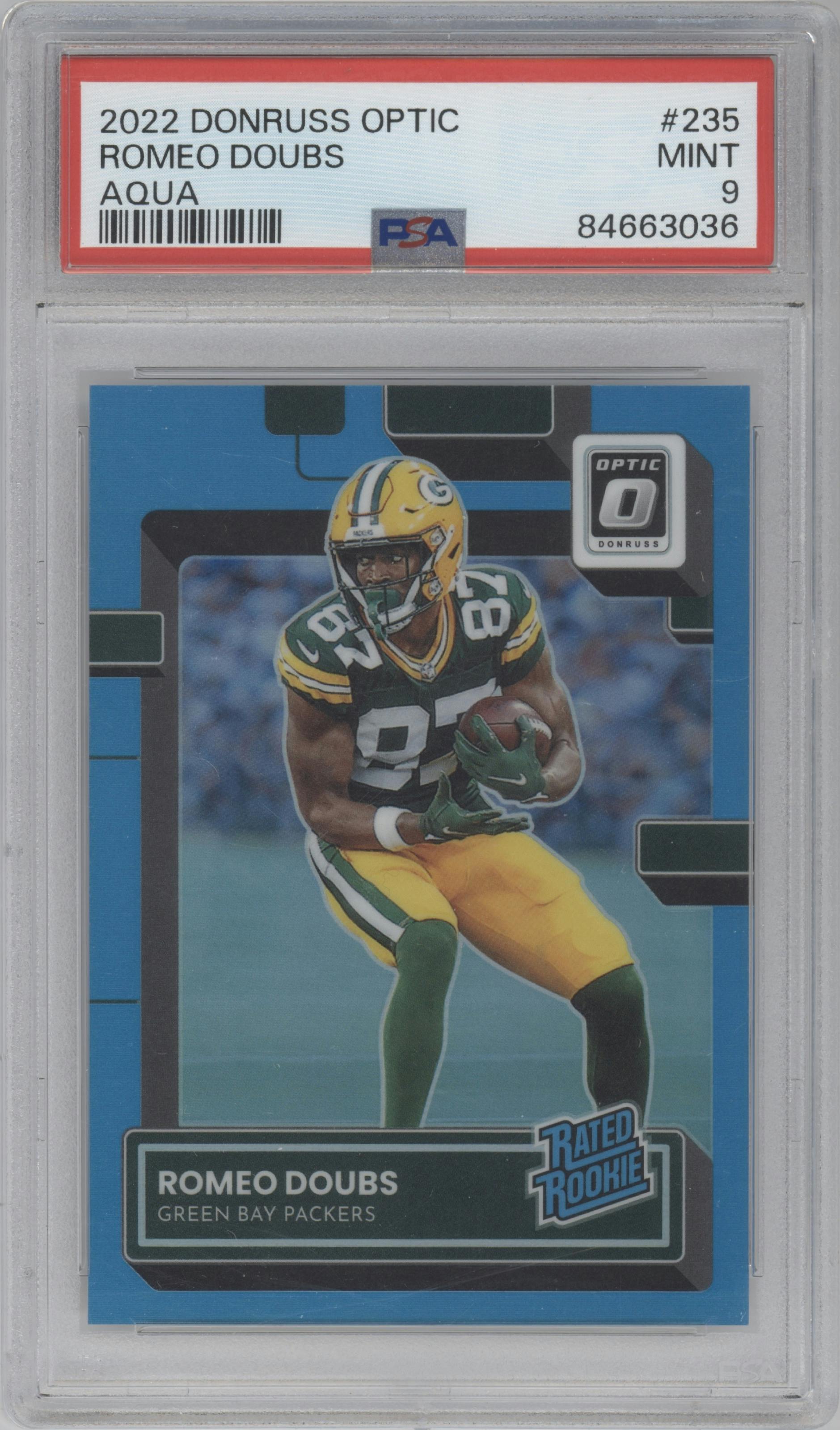 Romeo Doubs from the 2022 Panini Donruss Optic set featuring a Aqua parallel graded by PSA and given an overall grade of 9.