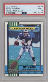 Troy Aikman from the 1990 Topps set graded by PSA and given an overall grade of 9.