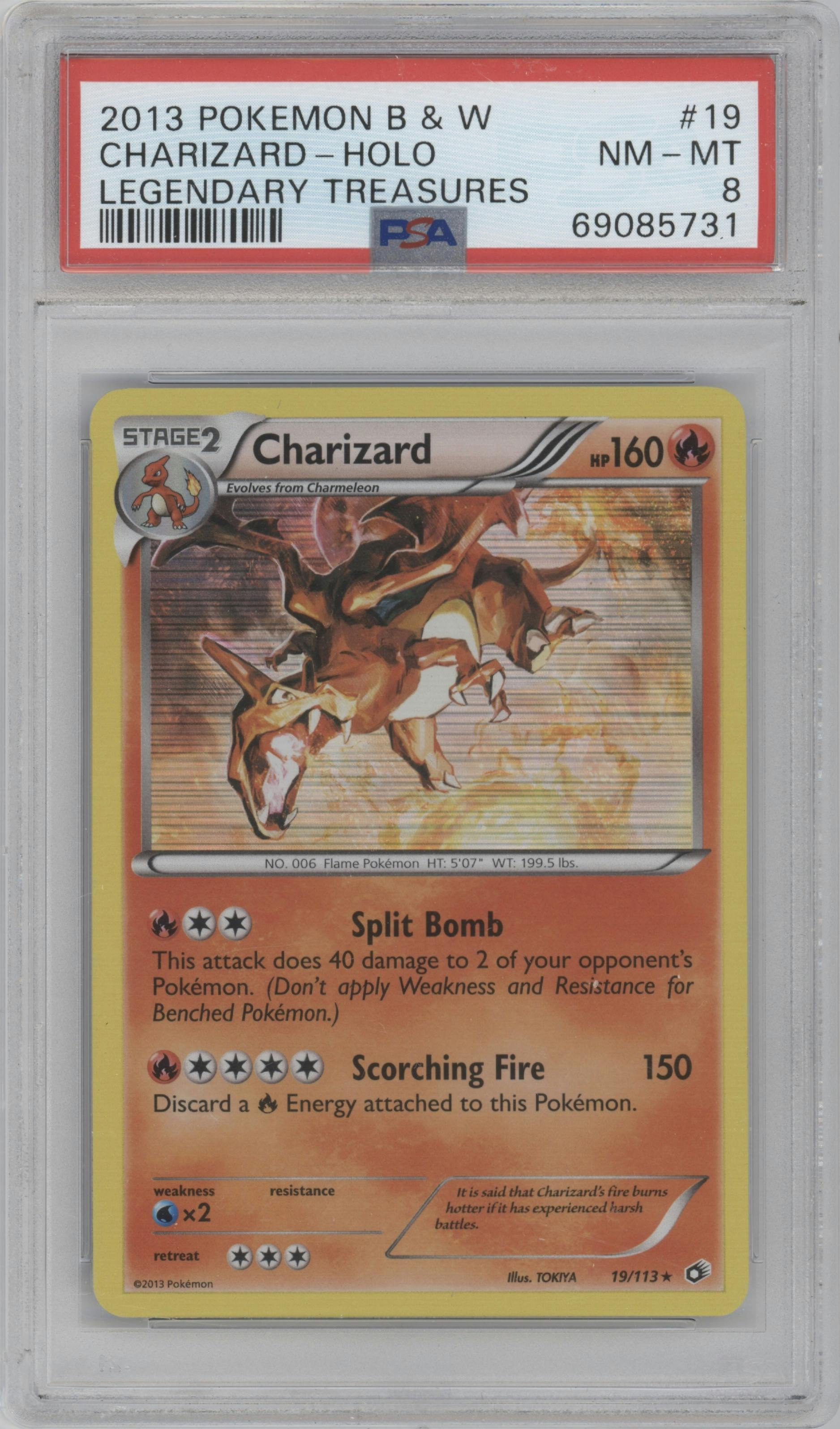 Charizard from the 2013 Pokemon B&W set graded by PSA and given an overall grade of 8.