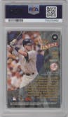 Derek Jeter  from the 1998 Topps Mystery Finest set featuring a Refractor parallel graded by PSA and given an overall grade of 8.