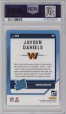 Jayden Daniels from the 2024 Donruss set featuring a Press Proof Blue parallel graded by PSA and given an overall grade of 9.