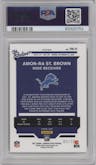 Amon-Ra St. Brown from the 2021 Panini Donruss Optic set featuring a Gold parallel graded by PSA and given an overall grade of 9.