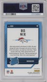 Bo Nix from the 2024 Donruss set featuring a Pink parallel graded by PSA and given an overall grade of 10.