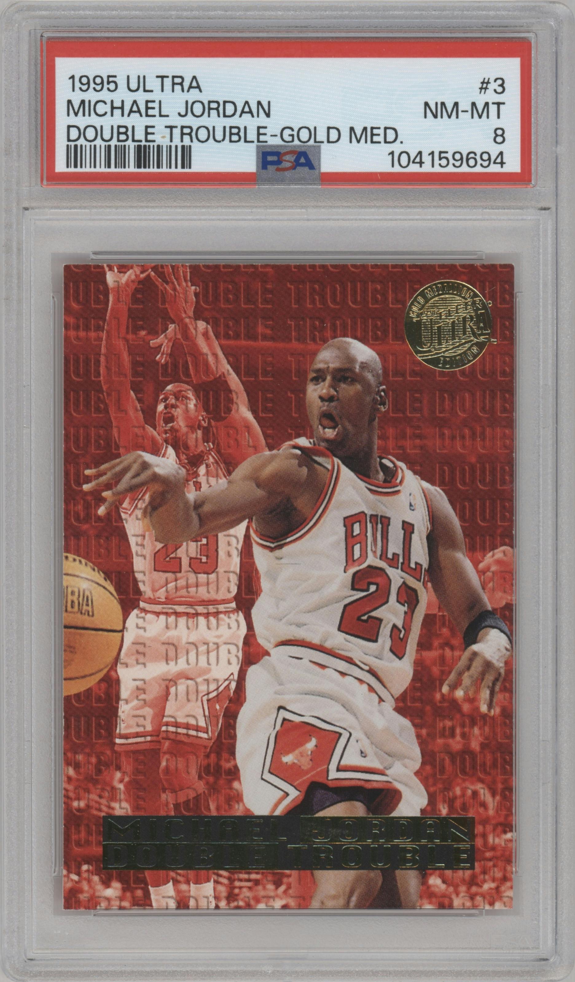 Michael Jordan from the 1995-96 Fleer Ultra set featuring a Gold Medallion parallel graded by PSA and given an overall grade of 8.