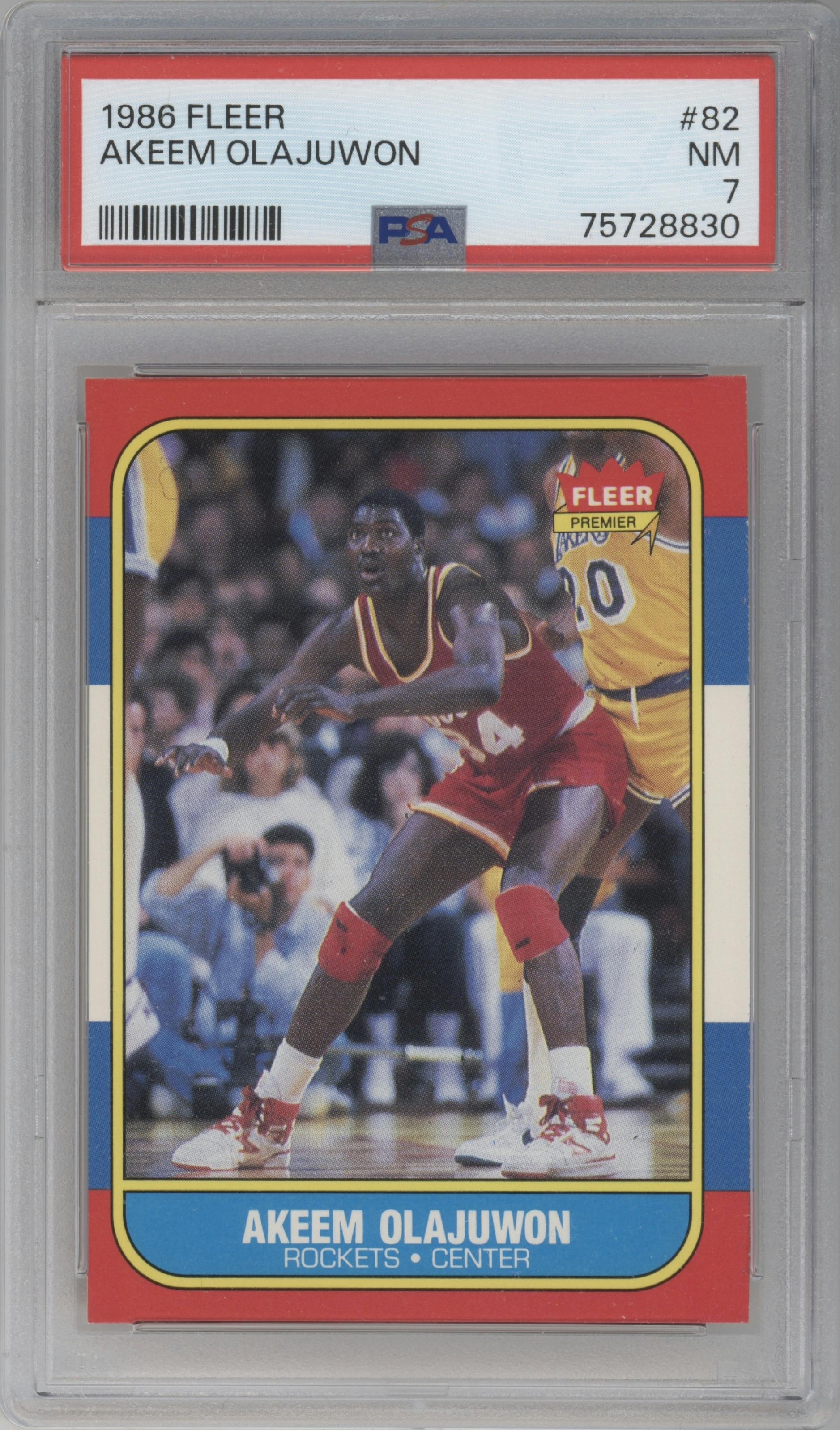 Akeem Olajuwon from the 1986-87 Fleer set graded by PSA and given an overall grade of 7.