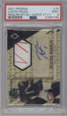 Justin Fields from the 2021 Panini Phoenix set featuring a Vapor Jet parallel graded by PSA and given an overall grade of 9.