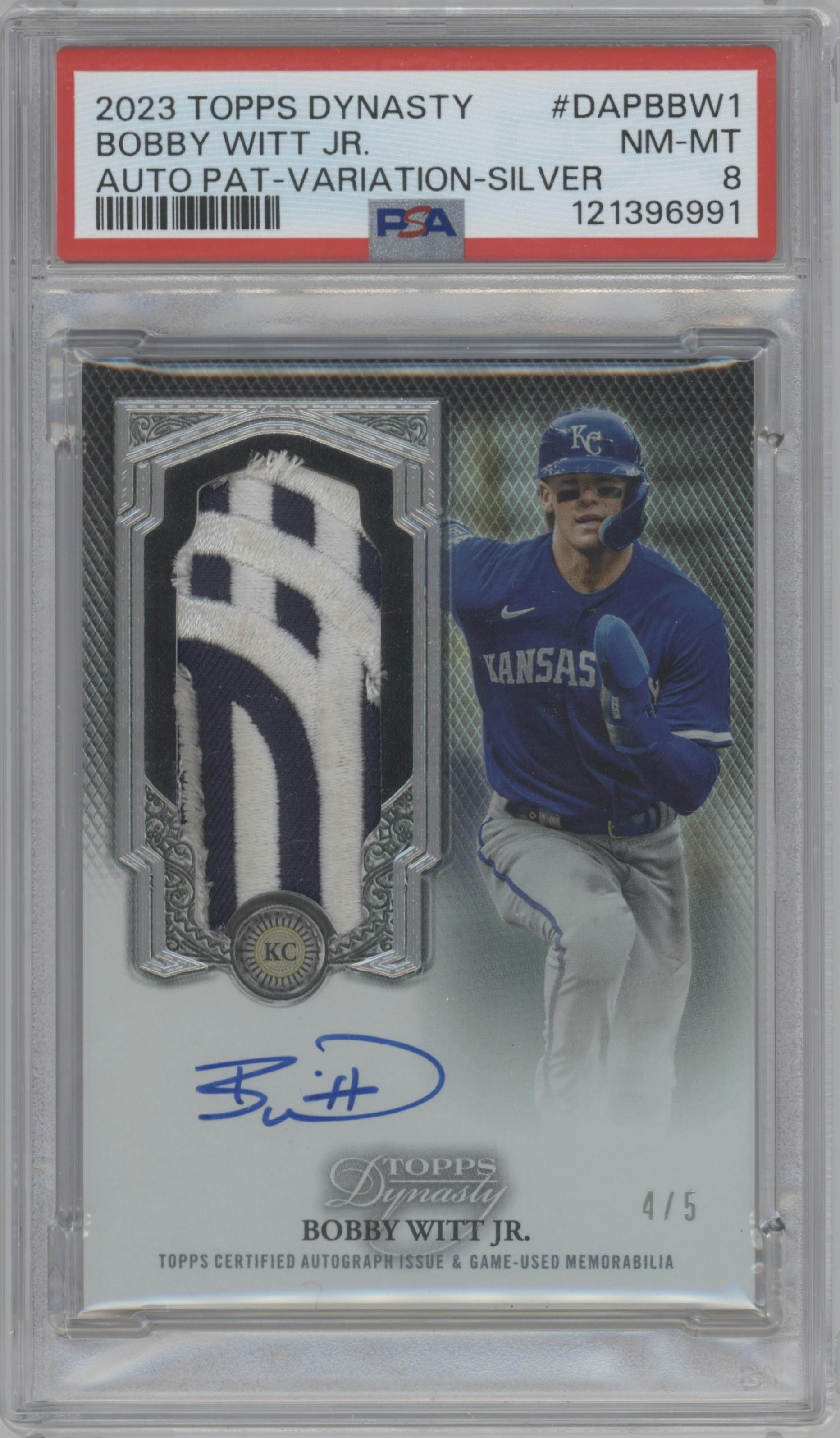 Bobby Witt Jr. from the 2023 Topps Dynasty set featuring a Silver parallel graded by PSA and given an overall grade of 8.