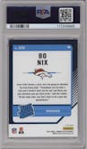 Bo Nix from the 2024 Donruss Optic set featuring a Pink parallel graded by PSA and given an overall grade of 10.