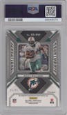 Ricky Williams from the 2023 Panini Prizm set featuring a Green Scope parallel graded by PSA and given an overall grade of 9.