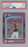 Jayden Daniels from the 2024 Donruss set featuring a Pink parallel graded by PSA and given an overall grade of 9.