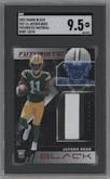 Jayden Reed from the 2023 Panini Black set featuring a Ruby parallel graded by SGC and given an overall grade of 9.5.