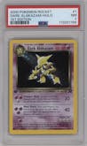 Dark Alakazam from the 2000 Pokemon set graded by PSA and given an overall grade of 7.