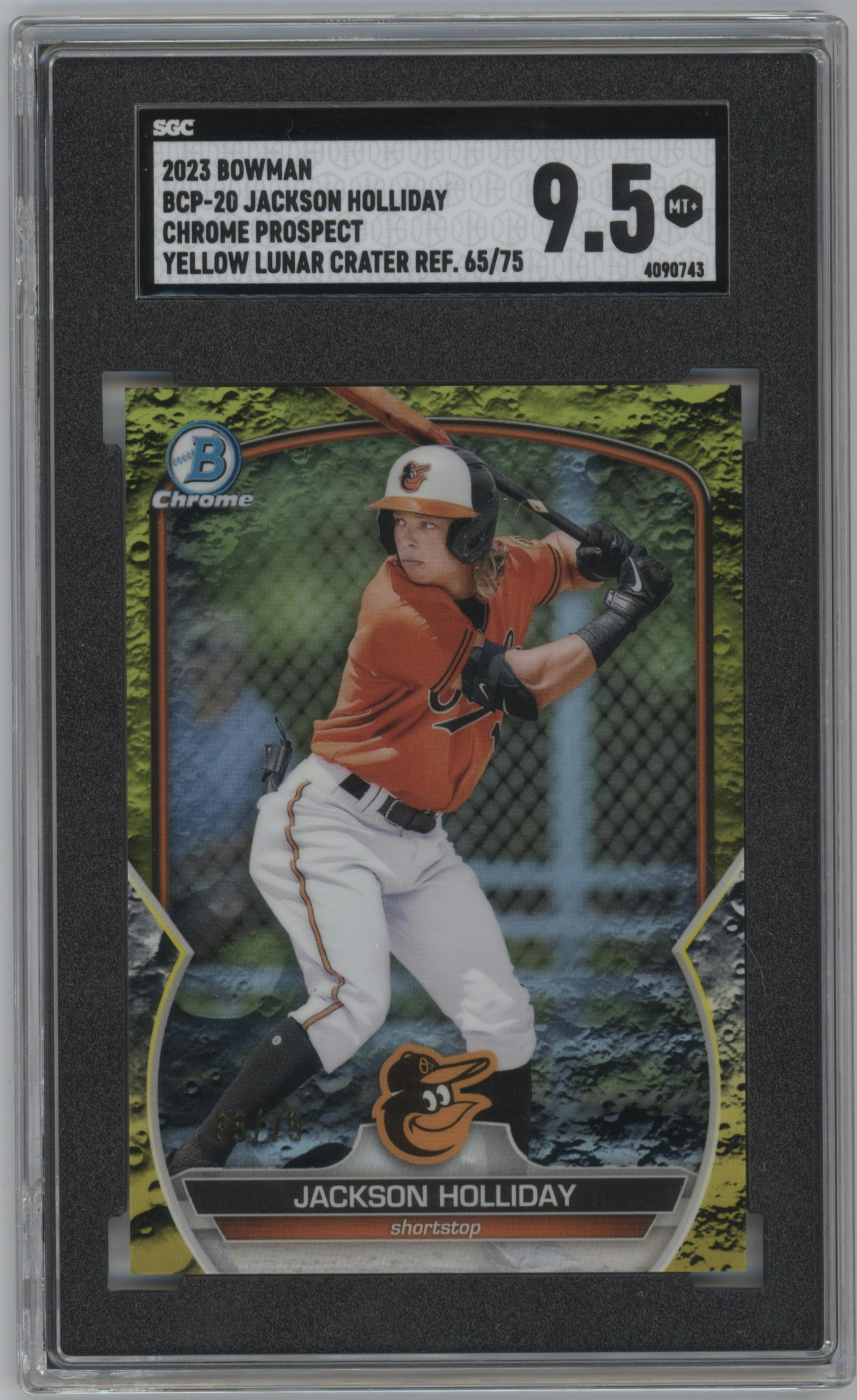 Jackson Holliday from the 2023 Bowman  set featuring a Yellow Lunar Crater Refractor parallel graded by SGC and given an overall grade of 9.5.