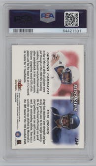 Giovanni Carmazzi/Tom Brady from the 2000 Skybox Dominion set graded by PSA and given an overall grade of 8.