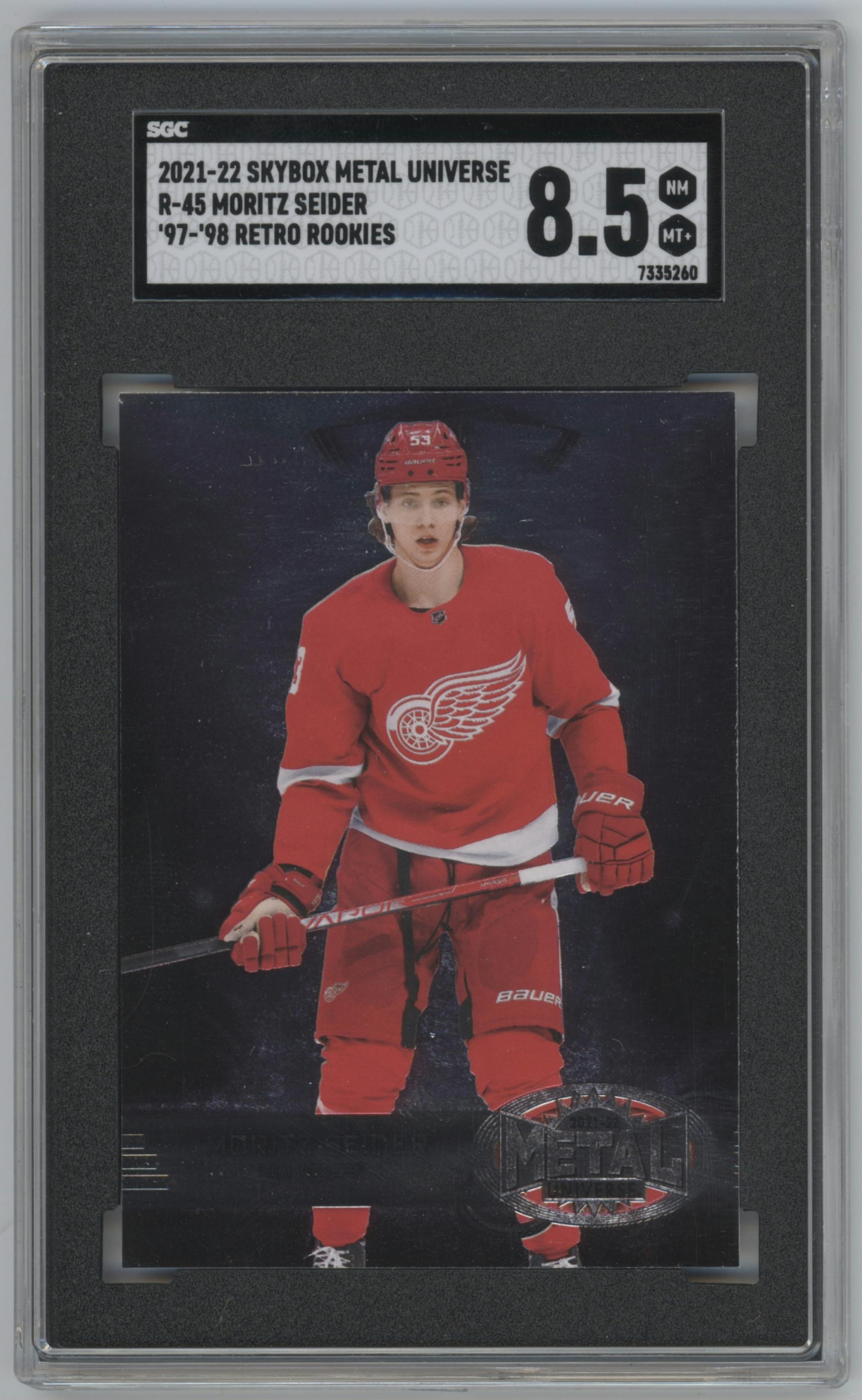 Moritz Seider from the 2021-22 Skybox Metal Universe set graded by SGC and given an overall grade of 8.5.