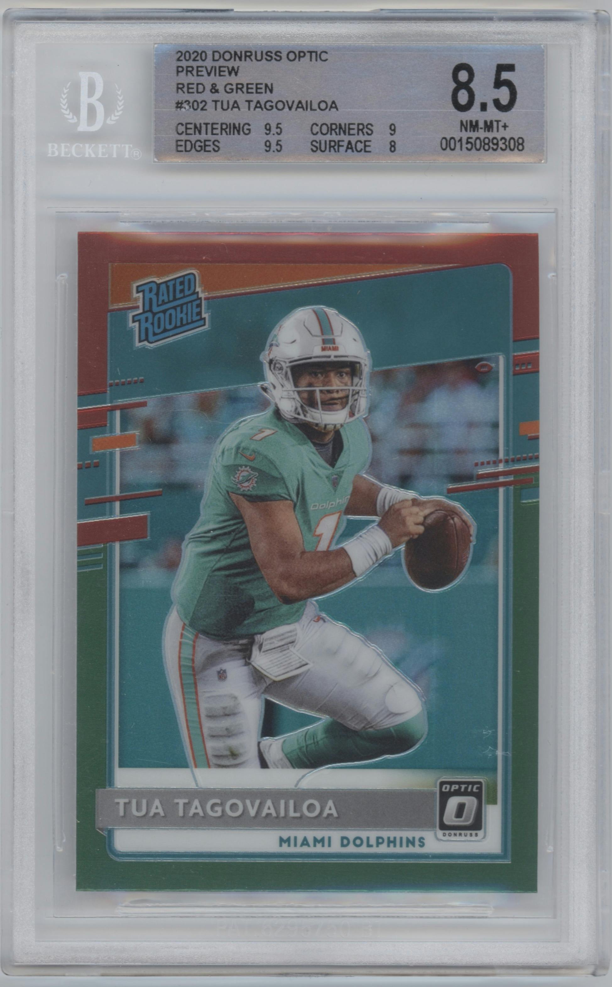 Tua Tagovailoa from the 2020 Panini Donruss set featuring a Red and Green parallel graded by Beckett and given an overall grade of 8.5.