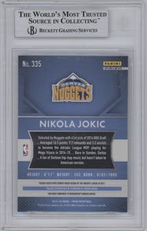 Nikola Jokic from the 2015-16 Panini Prizm  set featuring a Red/White/Blue Prizm parallel graded by Beckett and given an overall grade of 9.